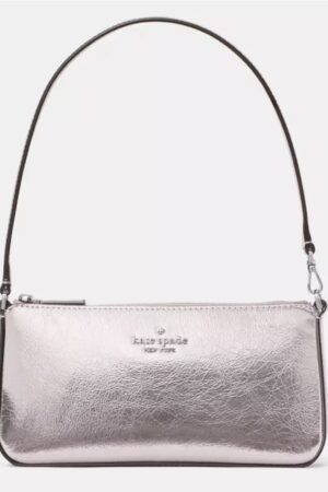 Kate Spade Gemini Metallic Convertible Wristlet in a shimmery pink or lilac moonlight metallic leather.